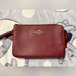 Coach burgundy Wristlet